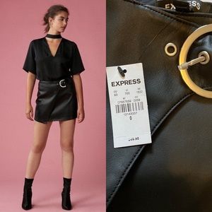 black faux leather belted asymmetrical mini skirt